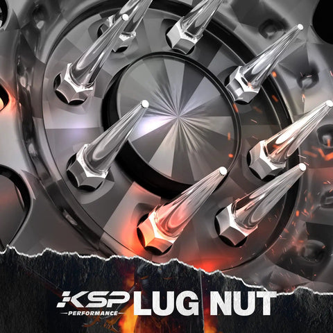 Close-up of Spike Lug Nuts Set M14x1.5 Chrome 32 Piece For 60 Degree Cone Seats 19mm Hex Closed End on wheel, silver spikes at center.