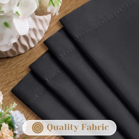 Close-up of stacked Black Halloween Privacy Curtains Two Panels 52 By 72 Inches Light Filtering Window Drapes.