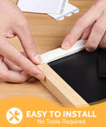 Heavy Duty Picture Hanging Strips Solid As A Rock For Wall Frames And Decor, Zero Wall Damage, Super Durable Adhesive Holds Firm Without Any Nails, No Sweat Installation, Bright White being applied to a frame.