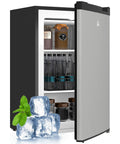 Compact Upright Freezer With 3 Cu Ft Capacity And Reversible Silver Door Featuring Easy Turn Thermostat for storing drinks and ice.
