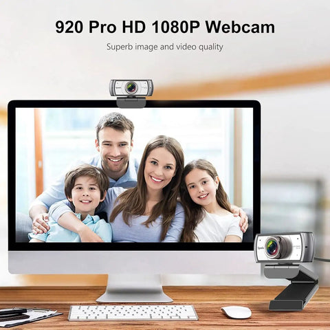 Sweet 120 Degree Wide Angle Webcam Loaded With Punchy Noise Canceling Mic For Zero Glitch Boardroom Meetings And Totally Hassle Free Telecommuting Video Calls On Any Desktop, on monitor with family smiling.