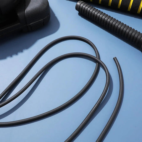 Heavy Duty Rubber Caulk Saver Strip For Concrete Joints Built Nails Tough Hella Flexible Black Weatherproof Wall Door Gap Sealer Universal Crack Stopper Five Meter Roll, close-up view of flexible black rubber strips.