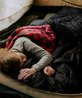 Person sleeping in 0 Degree Four Season Sleeping Bag For Adults With Cotton Flannel Cozy XXL Big And Tall Camping Sleeping Bag