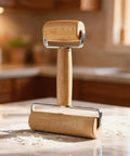 Mini Wooden Rolling Pin For Dough With Double Handles Nonstick Pizza Roller on kitchen counter with flour, made of beech wood.