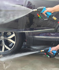 5000 PSI Beast Power Pressure Washer Gun With Swivel, Foam Cannon in use on a car and driveway, showing high-pressure cleaning