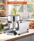 Premium 220 Stainless Steel Commercial Electric Food Strainer And Press Machine For Puree, Sauce, And Juice Making in a kitchen setting.