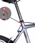 Close-up of red quick release bike seat post clamp set, 10 pack, no tools needed for height adjustment, cam lever for secure fit.
