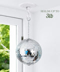 Heavy Duty Adhesive Swivel Hooks Four Pack No Drill Rotating Wall Mounts For Living Room Lights Indoor Plants Wind Chimes Effortless Breezy Hangin Setup To Level Up Your Personal Space holding a disco ball indoors.