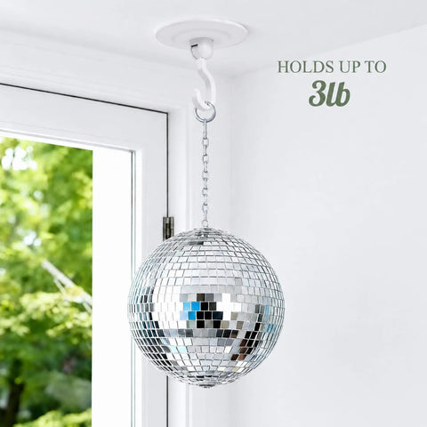 Heavy Duty Adhesive Swivel Hooks Four Pack No Drill Rotating Wall Mounts For Living Room Lights Indoor Plants Wind Chimes Effortless Breezy Hangin Setup To Level Up Your Personal Space holding a disco ball indoors.