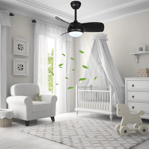 30 Inch Matte Black Ceiling Fan With Lights, Silent Reversible Motor, Remote Control in kids room with crib and armchair.
