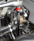 Versatile 9 Piece Ball Joint Socket Adapter Kit For Mechanics And DIYers With High Strength Steel Extensions To Tackle Tight Engine Slots and Confined Spaces Smoothly. Socket adapter in engine bay tightening a fastener near hoses