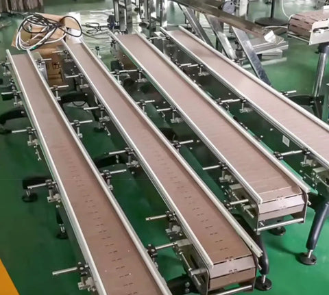 Rock Solid One Meter Flat Top Conveyor Chain With 38.1mm Pitch And 152.4mm Width Single Hinge Direct Drive Transmission for beverage lines, showing conveyor sections.