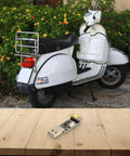 USB To TTL Programmer Cable For STC Microcontrollers on wooden table, garden scooter in background