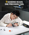 User operating Badass Brushless Electric Detail Sander For Sweet 3D Print Finishing And Quick Model Sanding With Jam Free Reciprocating Design And Built Tough For Maker Folks, with sanding heads and tools on a table.