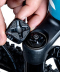 Ultimate Suspension Fork Cap Removal Tool For Fox And RockShox Top Caps With Six Sided Design being used on a bicycle fork cap.