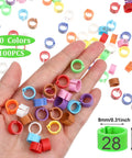 Hand holding 100 Pack 8mm Colorful Readable Leg Bands For Baby Chick And Small Birds, Clip On Identification Rings With Numbers 0 To 100