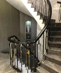 Game Changing Black And Gold Aluminum Stair Balusters Featuring 270 Degree Adjustable Brackets For Easy Indoor Or Outdoor Railing Projects No Sweat Installation Weather Resistant Spindles 20 Pack showcased in a modern staircase.
