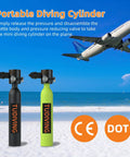 Portable diving cylinder in black and green on a beach background with airplane overhead