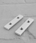 4 Pack M6 T Slot Nut With Double Groove Guide Rail Slider in aluminum alloy on gray surface