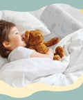 Child hugging teddy bear beside Bed Rail Bumpers For Toddlers And Kids With Foam Guard Stay Put Adjustable Straps on bed