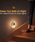 4 Pack Plug In LED Night Lights With Light Sensor Auto On At Dusk For Kids Room And Nursery Kid Friendly Night Lights Also Ideal For Bathroom Hallway And Staircase Compact Wall Outlet Friendly Design Warm White Glow. Image shows a glowing night light in a staircase.