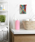 Installed Six Pack Wall Mount Organizer Set Acrylic File Holder Adhesive Cabinet Door Organizer in bathroom with toiletries.