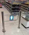 Heavy Duty Self Closing Safety Gate With Post Mount Bracket, Auto Swing Barrier Door For Retail Aisles And Warehouse Security, in a store aisle.
