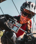 Cyclist using Go To All In One Bike Repair Tool With Tubeless Kit And Chain Breaker, Heavy Duty Stainless Steel Build on MTB.
