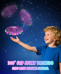 Child playing with Mini UFO Flying Toy Drone For Kids With 360-Degree Gesture Control And LED Lights, hands free flight.