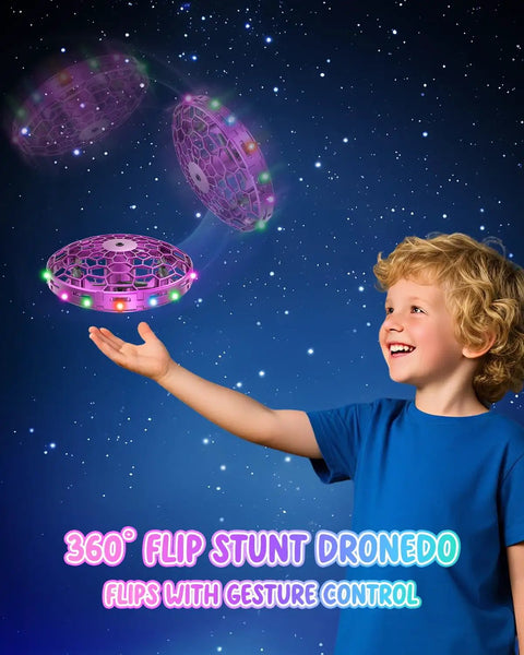 Child playing with Mini UFO Flying Toy Drone For Kids With 360-Degree Gesture Control And LED Lights, hands free flight.