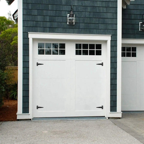 White garage door with Six Piece 4 Inch T Hinge Set For Doors And Gates, Rust Proof Black Hardware, on dark exterior wall