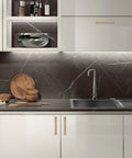 Modern kitchen with 10 Pack 5 Inch Champagne Bronze Cabinet Handles For Kitchen Cabinets And Furniture Pulls installed on white cabinets.