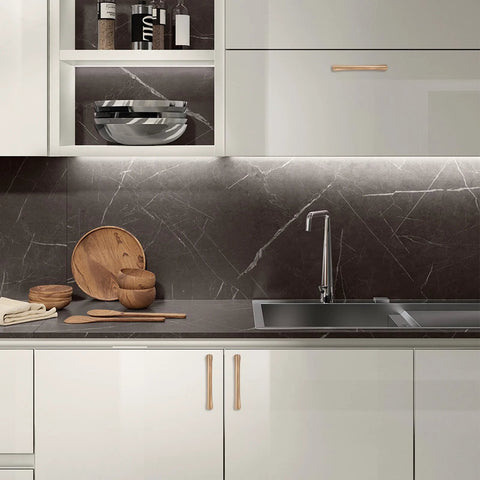 Modern kitchen with 10 Pack 5 Inch Champagne Bronze Cabinet Handles For Kitchen Cabinets And Furniture Pulls installed on white cabinets.