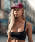 Woman wearing 'Not The Stepdad The Dad Who Stepped Up' deep rose adjustable golf trucker hat in an urban setting.