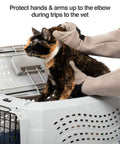 Multipurpose Pet Grooming Glove For Dogs And Cats Water Resistant And Puncture Scratch Resistant Easy Grooming On The Go Vet Visits And Handling Durable Gray With 12 Month Warranty being used on a cat in a pet carrier