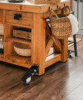 Badass Heavy Duty Workbench Casters Set Of Four With Smooth As Butter Urethane Wheels on wooden table for easy mobility.