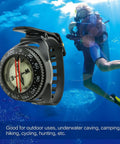 Diving scene with All Weather Dive Compass With Built In Light For Clear Readings Anywhere Waterproof Survival Tool on blue background.