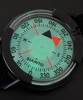 Close-up of all weather wrist compass with Velcro strap for easy navigation from city streets to backcountry.