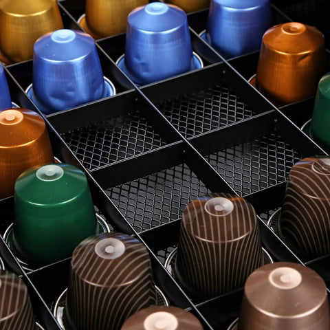 Keep Your Kitchen Game Tight With This Metal Coffee Pod Drawer Holds Sixty Nespresso Capsules Effortless Slide Design Lets You Snag Pods Without Breaking A Sweat, showcasing colorful Nespresso capsules in a stylish drawer.