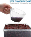 Hand using a measuring cup to scoop beans from Large Tall Airtight Food Storage Set, 10 Pack Plastic Canisters For Your Kitchen And Pantry Organization, With Labels, Ideal For Flour Sugar Rice And More Everyday.