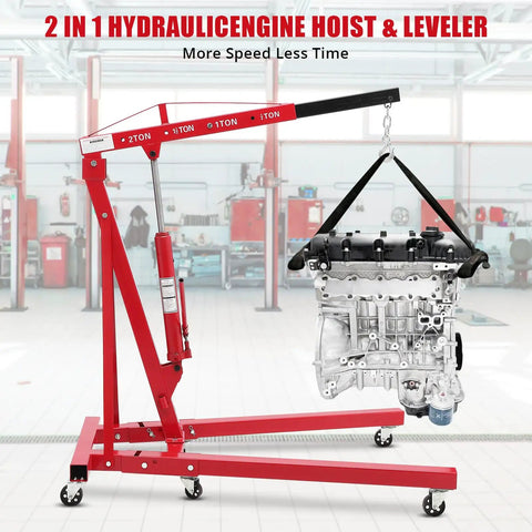 2 Ton Cherry Picker Engine Hoist Folds Flat To Save Bay Space Rolls Smooth On Six Heavy Duty Casters Includes Hand Pump For Garage Crew Auto Projects 4400 Lb with engine raised.