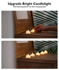100 Pack Flameless LED Tea Light Candles Bulk With Long Lasting Battery flickering on a wooden surface indoors.