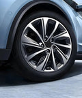 Solid 4 Pack Wheel Center Caps Black 2.36 Outer Diameter 2.2 Inner Diameter Tough ABS Plastic Rim Hub Covers Glossy on a modern wheel.