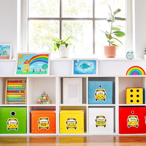 120 Pack School Bus Name Tags In 6 Cartoon Styles For Classroom Use displayed on labeled cubbies in a colorful children's room