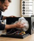 Oversized Heavy Weight Polyester Fiber Speaker Damping Fill Sheet Tough As Nails Acoustic Stuffing For Diy Subwoofer Enclosures Cabinet Repair And Car Audio being placed inside a speaker cabinet by a person.