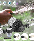 Hands demonstrating 12V RV Water Pump Self Priming With 4 GPM At 45 PSI And Pressure Switch Plug And Play Kit With Hoses Debris Filter Manual
