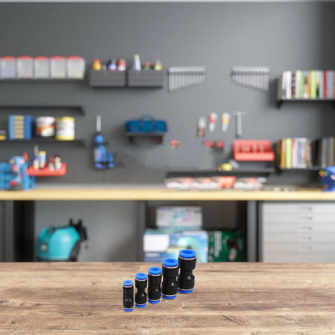 Get The Ultimate Air Hose Fittings Kit With 50 Pieces Of Quick Connect Pneumatic Push to Connect Adapters In Copper And Abs For Air Compressors In 4mm To 12mm Sizes That Are Built Tough For Auto Work And Heavy Duty Jobs All Season Long, assorted fittings on bench
