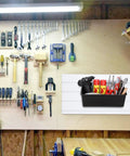 Large Slatwall Bins Set of 4 for Garage and Workshop Storage installed on a slatwall holding tools and supplies in a workshop.