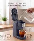 One Touch Single Cup Coffee Brewer With Quick Brew, 12 Oz Grey Coffee Maker being filled with water in a kitchen setting
