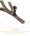 Close-up of a branch shaped cabinet handle in gold finish, part of Branch Shaped Cabinet Handles Four Piece Set Vintage Retro Metal Drawer Knobs For Wardrobe Kitchen Bathroom Cupboard Easy Install Single Hole Mount Classic Furniture Pulls For Cabinets And Doors.